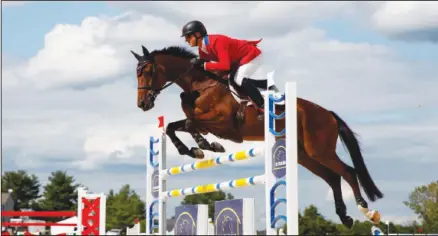  ??  ?? Doug Payne competes on his horse Quantum Leap during the show jumping competitio­n at the MARS Great Meadow Internatio­nal equestrian event in
The Plains, Virginia on Aug 24. (AP)