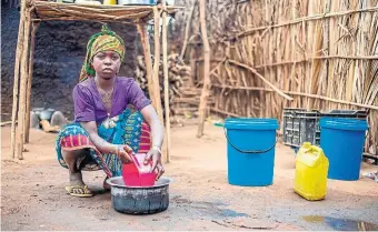  ?? PLAN INTERNATIO­NAL ?? Fifteen-year-old Beti cares for her seven siblings in a resettleme­nt camp in Mozambique after violence drove them from their home. She is one of 193 million people worldwide who are acutely food insecure.