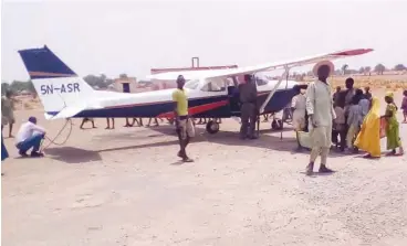  ??  ?? The Kebbi State Deputy Governor’s private aircraft when it landed at the airstrip at Tuga area of Bagudo during one of his official trips to the area. Ismail Adebayo