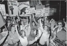  ?? Photo / NZME ?? Marchers on Queen St in 1972 show solidarity with the Polynesian Panthers.