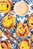  ??  ?? g Who ate all the pies? Try to resist Portugal’s moreish pasteis de nata