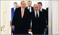  ?? Picture: AP ?? PEAS IN A POD: Russian President Vladimir Putin, right, and Turkish President Recep Tayyip Erdogan