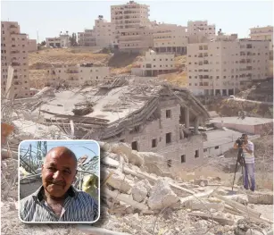  ?? (Tovah Lazaroff) ?? DEMOLISHED STRUCTURES in Wadi Hummus by the security barrier the morning after IDF enforcemen­t action there. Inset: Wadi Hummus resident Ghaleb Abu Hadwan, whose home was demolished on Monday.