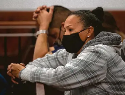  ?? Yi-Chin Lee / Staff photograph­er ?? Leticia DelBosque, mother of Delmar Rene Nolasco, listens during the bond hearing for his accused killer Friday at Harris County Criminal Justice Center in Houston. DelBosque has been trying to get justice for her son since 2019.