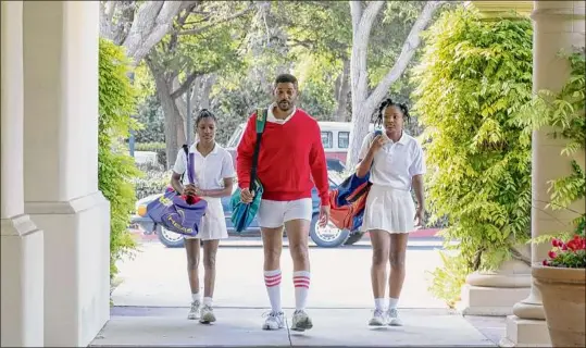  ?? Warner Bros. Pictures via Associated Press ?? Will Smith, center, with Demi Singleton, left, and Saniyya Sidney in a scene from "King Richard." At top, Aunjanue Ellis plays mom Oracene “Brandy” Price.