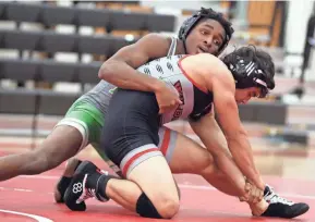  ?? SHANE FLANIGAN/THISWEEK ?? Scioto sophomore Ty Wilson is competing at 132 pounds after winning the Division I state title at 113 last year. He started this season by winning 29 of his first 32 matches in his new weight class.