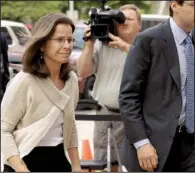  ?? AP/CHUCK BURTON ?? Wendy Button arrives at court Tuesday in Greensboro, N.C., where the former speechwrit­er for John Edwards testified in Edwards’ corruption trial.
