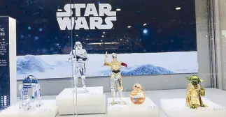  ??  ?? May the peace be with you: Swarovski Star Wars figurines at Rustan’s