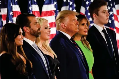  ?? Photograph: Saul Loeb/AFP/Getty Images ?? From left, Kimberly Guilfoyle, Donald Trump Jr, Tiffany Trump, Donald Trump, Melania Trump and Barron Trump at the White House on 27 August 2020.