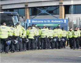  ??  ?? >
Police at St Andrew’s for the Blues v Villa fixture in March