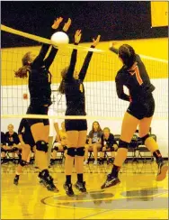  ?? MARK HUMPHREY ENTERPRISE-LEADER ?? Prairie Grove senior Riley Gerwig and sophomore Kayley Anderson team up for a block against Gravette. The Lady Tigers fell behind before winning a home volleyball match (24-26, 13-25, 25-23, 25-18, 15-9) against Gravette Sept. 27.