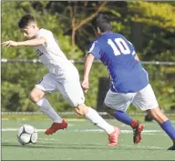  ?? H John Voorhees III / Hearst Connecticu­t Media ?? Bethel’s Bryan Osebio (10) goes by Abbott Tech’s Jacob Villa (10) in the boys soccer game between Bethel and Abbott Tech high schools, Oct. 3, 2018, at Broadview Middle School in Danbury.