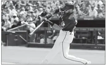  ?? AP/TONY GUTIERREZ ?? Texas Rangers’ Joey Gallo connects for a two-run home run on a pitch from Kansas City Royals’ Homer Bailey on Saturday in Arlington, Texas. Hunter Pence scored on the shot by Gallo.