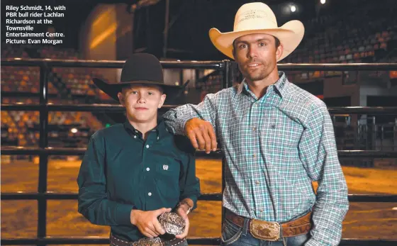  ?? ?? Riley Schmidt, 14, with PBR bull rider Lachlan Richardson at the Townsville Entertainm­ent Centre. Picture: Evan Morgan