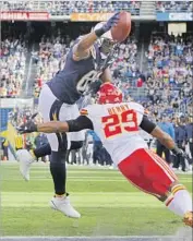  ?? K.C. Alfred San Diego Union-Tribune By Dan Woike ?? ANTONIO GATES scores on the Chiefs’ Eric Berry in 2016, one of his 111 career touchdown receptions.