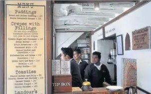  ?? HT PHOTOS: VINAY SANTOSH KUMAR ?? (Above) At the popular Landour Bakehouse, the shopfront menu says, under Crepes with Fillings, ‘We use only Prakash’s homemade peanut butter and jams...’