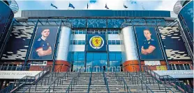  ?? ?? Giant images of Scotland captains Andy Robertson and Rachel Corsie will welcome Ukraine to Hampden on June 1