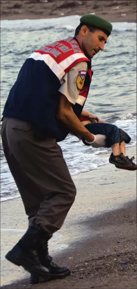  ??  ?? Harrowing: The image of Aylan Kurdi that has become a symbol of the desperate plight of Syrian refugees