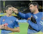  ??  ?? Kiwis Mitchell Santner, left, and coach Stephen Fleming were with the Chennai Super Kings in the IPL last season.