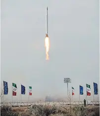  ?? SEPAH NEWS/AFP/GETTY IMAGES ?? Iranian military satellite Noor is launched from the Qassed two-stage launcher in the Markazi desert in Iran on Wednesday.