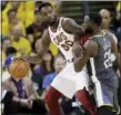  ?? MARCIO JOSE SANCHEZ — AP ?? Jeff Green is defended by Warriors forward Draymond Green during the first half of Game 2 of the NBA Finals on June 3 in Oakland, Calif.