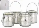  ??  ?? GET THE LOOK: Mercury hanging tealights, set of four, £25, The White Company