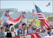  ?? ANDA CHU — STAFF PHOTOGRAPH­ER ?? SAN FRANCISCO: Protesters cheer during the Families Belong Together rally at Civic Center Plaza.