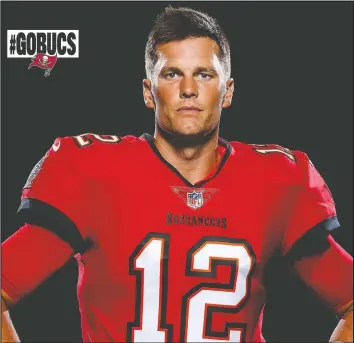  ??  ?? The Tampa Bay Buccaneers released the first photograph­s of their new quarterbac­k, Tom Brady, in uniform on Tuesday. The number looks right, but the colours?