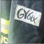  ?? TIMES photograph by Annette Beard ?? The GY6ix logo was put on the sleeve of a set of bunker gear given to the Pea Ridge Fire Department by the organizati­on.