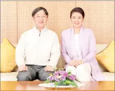  ??  ?? Crown Prince Naruhito (left) and Crown Princess Masako pose for a photo at their residence Togu Palace in Tokyo. — AFP photo