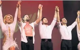  ?? DANCE WITH ME/COURTESY ?? Dance With Me founder Maksim Chmerkovsk­iy, second from left, and partners Val Chmerkovsk­iy and Tony Dovolani on stage with Peta Murgatroyd, of “Dancing With the Stars.”