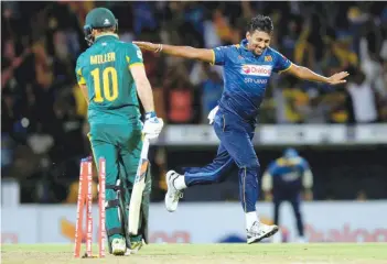  ?? — Reuters ?? Sri Lanka’s Suranga Lakmal celebrates after taking the wicket of South Africa’s David Miller.