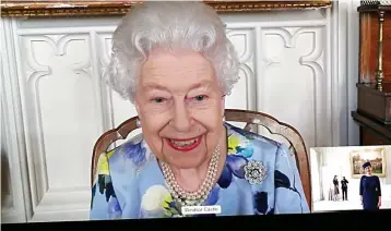  ??  ?? Beaming: The Queen on video link with Ivita Burmistre, the ambassador from Latvia