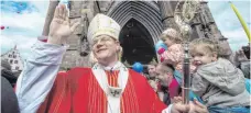  ?? FOTO: DPA ?? Der Freiburger Erzbischof Stephan Burger vor dem Münster in Freiburg. Wie es zu der Millionen-Panne kommen konnte, steht nicht fest.
