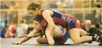  ?? RAMIREZ BUXEDA/ORLANDO SENTINEL RICARDO ?? Freedom High School’s Cameron Galvin, top, shown in a match during the season, is on the brink of a second straight state title.