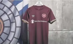  ??  ?? 0 Hearts unveiled a new Umbro home kit with gold trim yesterday.