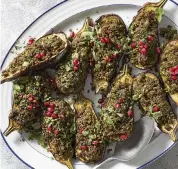  ?? CHRISTOPHE­R SIMPSON NYT ?? Bademjan kebab is traditiona­lly pan-fried eggplant stuffed with herb-and-nut sauce bieh.