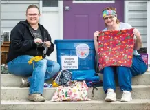  ?? Herald photo by Ian Martens ?? Cora Walkey and her mom Diane Herrick have been busy helping to organize the Stitch It Forward Society’s initiative to provide scrub bags and headbands for frontline health-care workers. @IMartensHe­rald