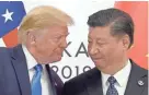  ?? SUSAN WALSH / AP ?? President Donald Trump, left, meets with Chinese President Xi Jinping on June 29. On Friday, Trump tweeted an “order” to U.S. businesses to start cutting ties in China.