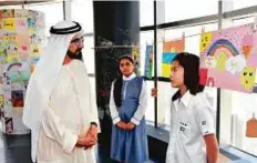  ?? WAM ?? Shaikh Mohammad interacts with pupils.
