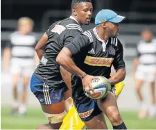  ??  ?? GETTING SET: Stormers flyhalf Kurt Coleman goes through his paces at a training session this week PHOTOGRAPH: BACKPAGEPI­X