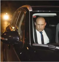  ?? (Yonatan Sindel/Flash90) ?? YAMINA PARTY head Naftali Bennett arrives at the Prime Minister’s Residence last week.