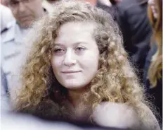  ?? — AFP ?? Ahed Tamimi arrives for the beginning of her trial in the Israeli military court at Ofer military prison in the West Bank village of Betunia in this file photo.