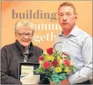  ?? SUBMITTED PHOTO ?? The Évangéline­Central Credit Union recently awarded the 2017 Volunteer of the Year Award to Marilla Millar of Ellerslie, recognizin­g her more than 40 years as a foster parent. Millar received the award from Jamie Colwill, an Évangéline-Central Credit...