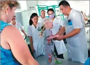  ?? PROVIDED TO CHINA DAILY ?? A Russian child with cerebral palsy gets treatment in Sanya Traditiona­l Chinese Medicine Hospital last summer.