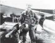  ??  ?? Then-U.S. Air Force Lt. George Latella poses in front of an F-4 Phantom in Vietnam in 1972. On Oct. 6, 1972, the F-4 he was co-piloting was hit by enemy fire, and he was forced to jump from the aircraft. He was captured by enemy forces and spent six...