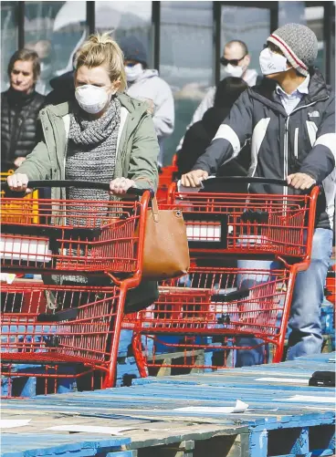  ?? VERONICA HENRI / POSTMEDIA NEWS FILES ?? Loblaw saw a bump in 2020 sales as shoppers patronized its full-service locations during the pandemic. But it also experience­d a shift away from its No Frills locations.