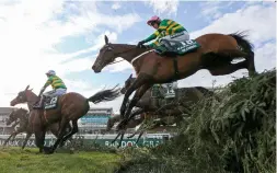  ??  ?? Runners stream over the water, competing for a £750,000 purse