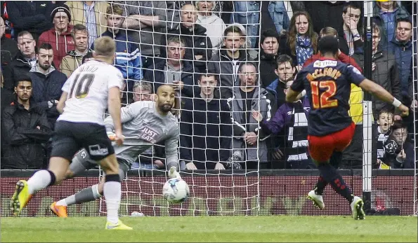  ?? PICTURES: Media Image Ltd ?? FINAL NAIL: Reading’s Garath McCleary sends Derby keeper Lee Grant the wrong way from the spot to make it 3-0