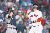  ?? Michael Dwyer / Associated Press ?? J.D. Martinez, right, celebrates his solo home run in front of Yankees catcher Austin Romine during the fourth inning Saturday.